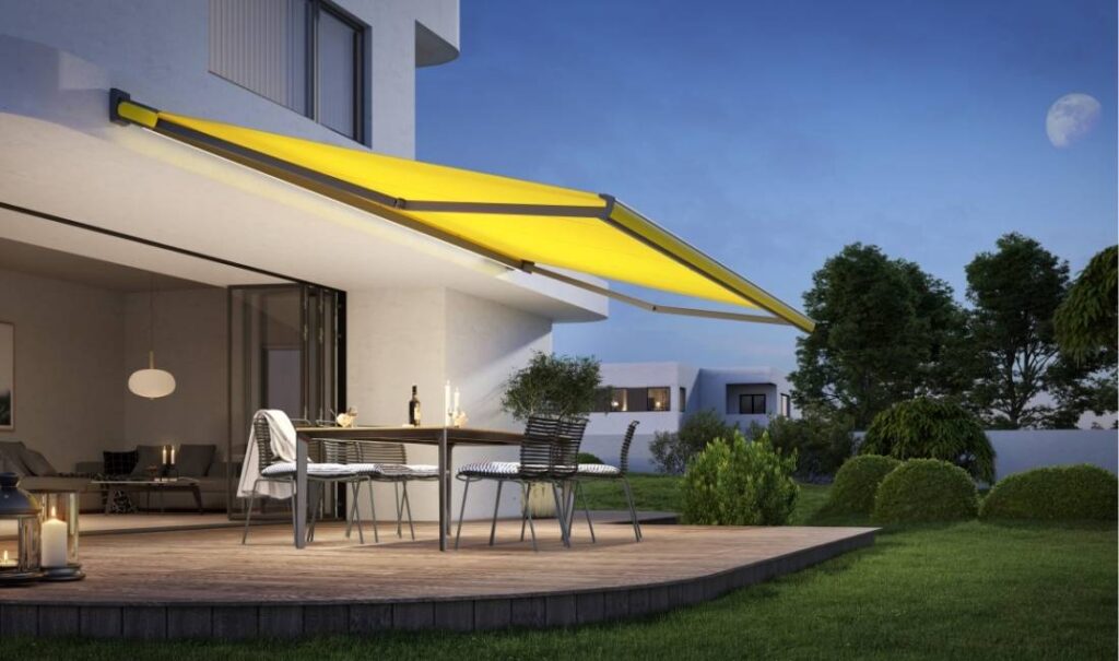 Motorised Awning Extended to give shade over decking area.